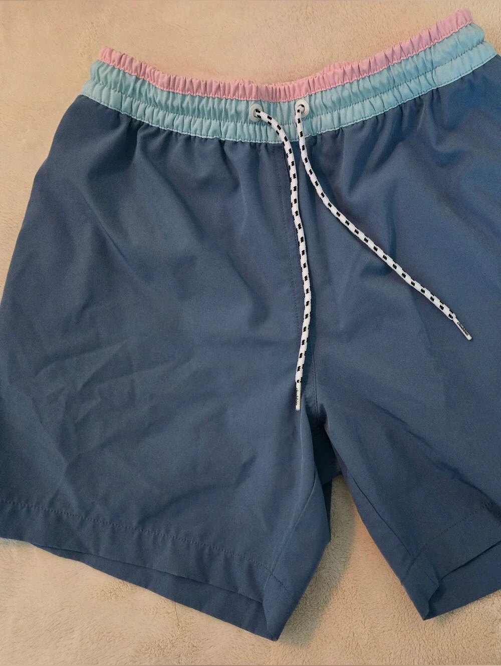 chubbies Blue Swim Trunks with Pink and Light Blue Waistband